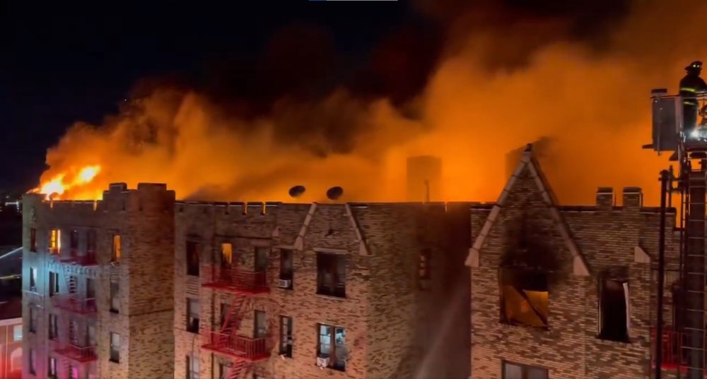 A fire burns at an apartment building at 2910 Wallace Ave. in the Bronx on Jan. 10, 2025.