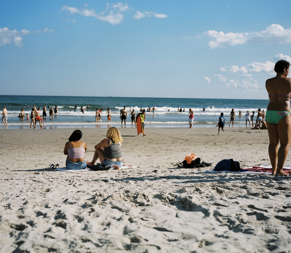 People gazing at the shoreline near Beach 98th Street in the Rockaways.