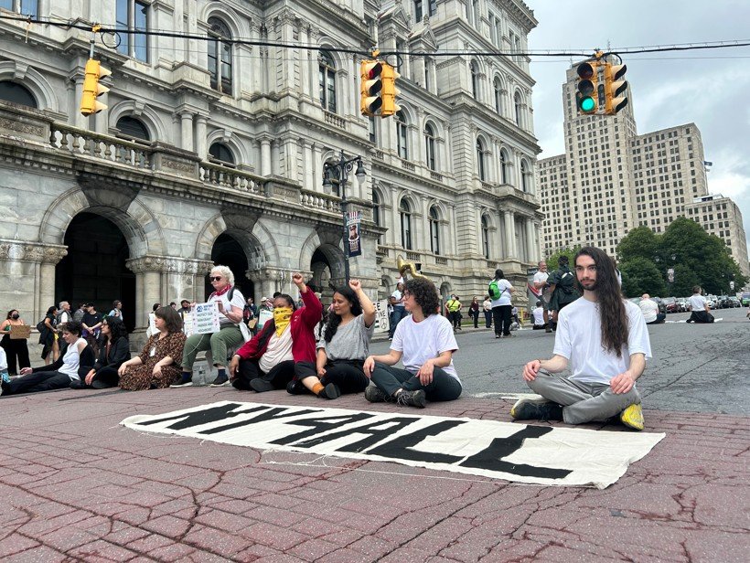Demonstrators blocking traffic.