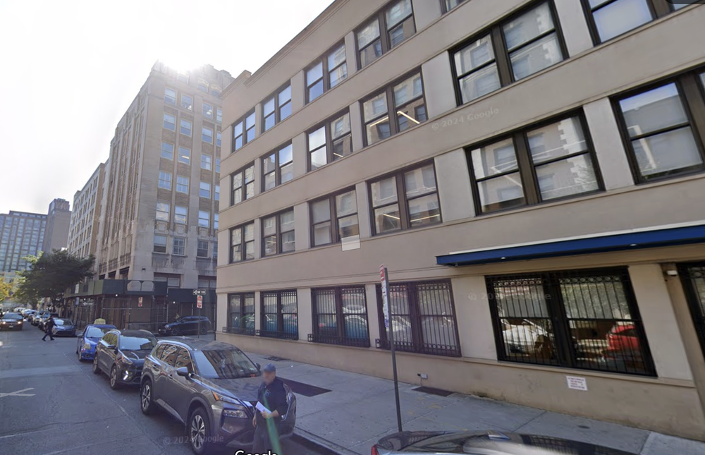 A Google Maps street view of Norman Towers in Queens