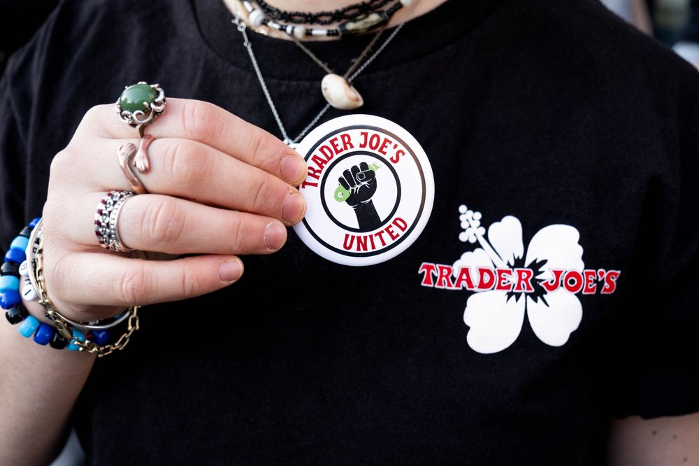 A photo of a Trader Joe's worker. Employees at a location on the Lower East Side are trying to unionize