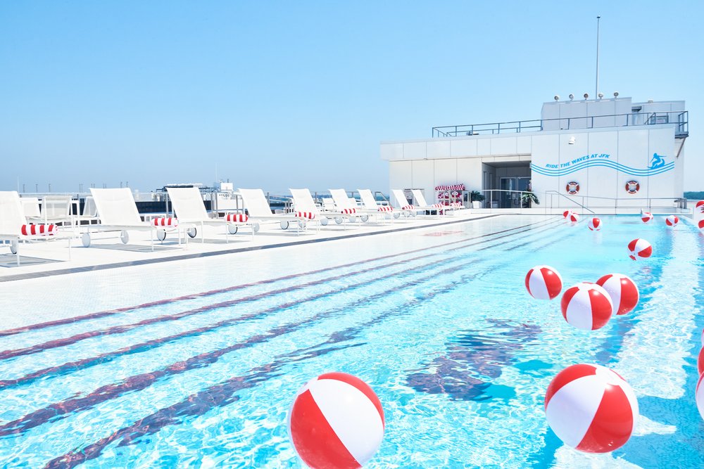 A pool with balls in the water