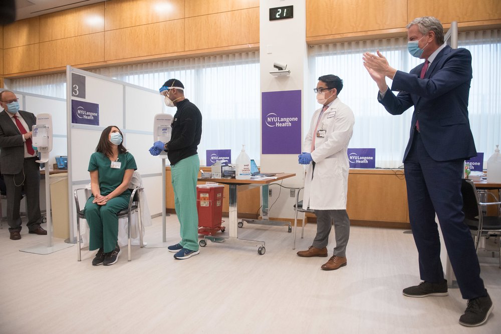 Mayor Bill de Blasio observes the vaccination of health care worker Tara Easter at NYU Langone Health in Manhattan, December 14th, 2020
