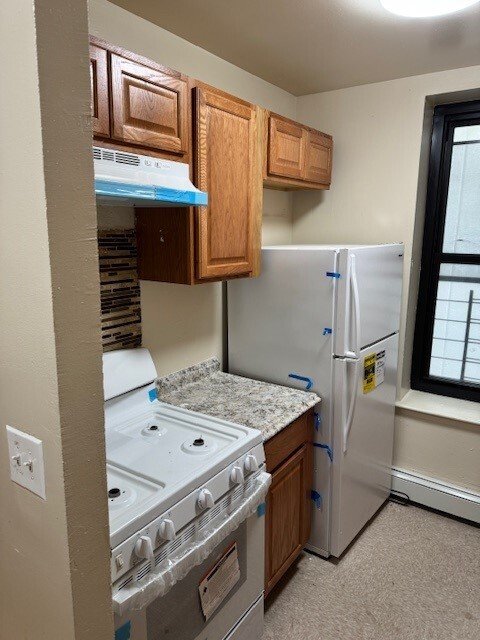 Photo of kitchen in an empty apartment