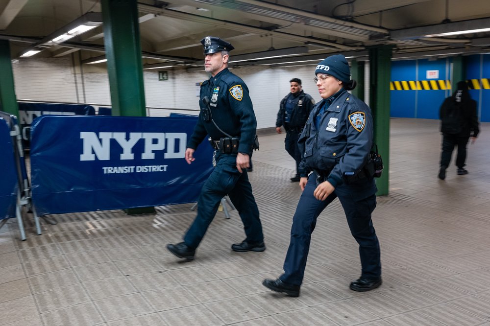 An image of police in a train station.