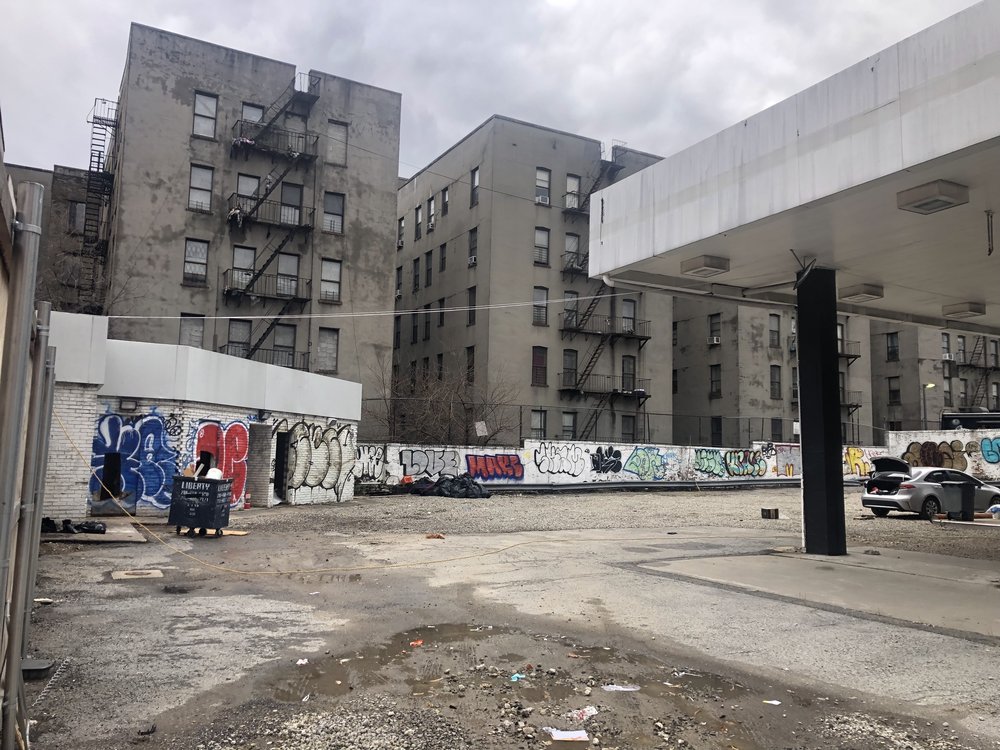 Lot on West 145th Street in Harlem, between Adam Clayton Powell Jr. Boulevard and Lenox Avenue, where a builder plans a truck depot after first proposing new housing, including affordable units.