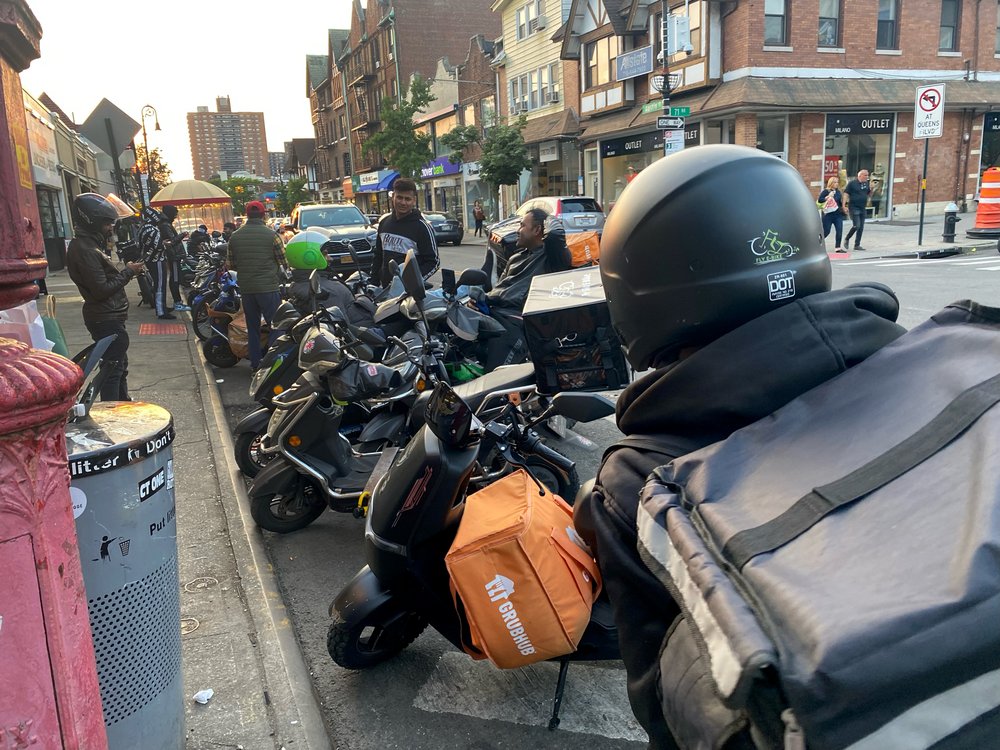A photo of app-based delivery workers