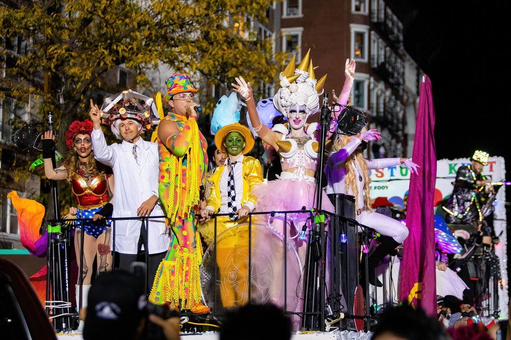 A group of costumed people on a float.