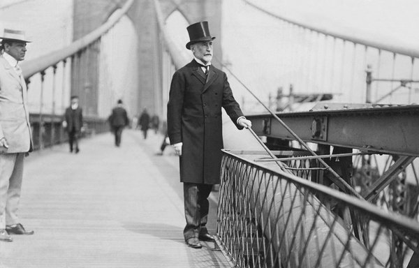 William Gaynor walking on the Brooklyn Bridge, 1910.