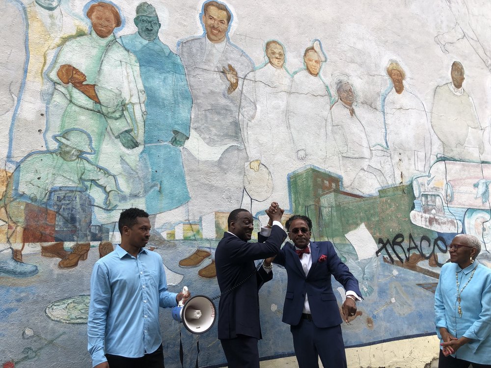 A photo of Yusef Salaam and Al Taylor endorsing each other
