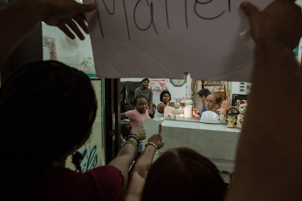 a2afbde1020180807gothamist_nailsalonprotest-9-jpg.jpeg Protesters outside a nail salon.<br>