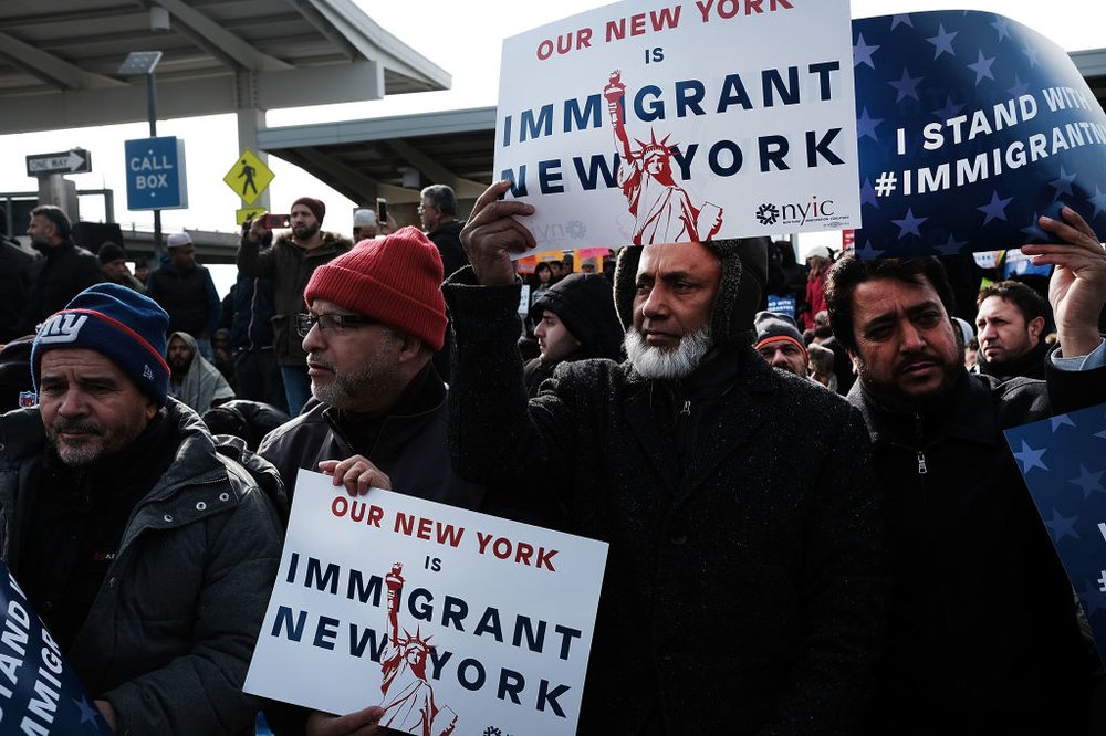 a3d42203egettyimages-633701016-jpg.jpeg Muslim men demonstrate JFK airport to protest President Donald Trump's immigration ban, February 3, 2017 <br>