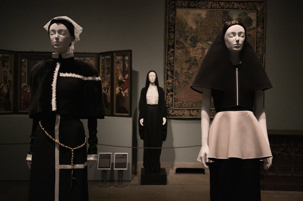 a7c64e12220180507-img_8548-jpg.jpeg A black mink outfit, on left, from Thom Browne<br>