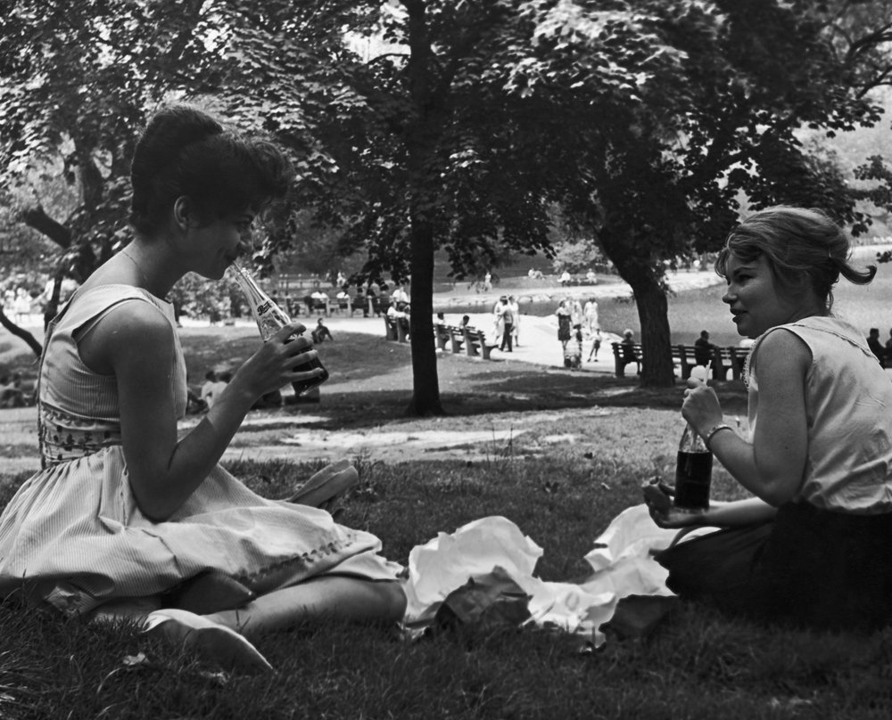 a871f78ab.jpeg "Two young women eating lunch in Central Park. July 1961."