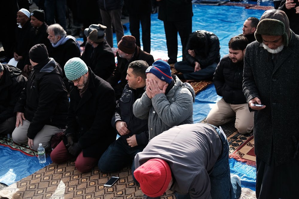 aa2791339gettyimages-633701180-jpg.jpeg Muslim men pray at a prayer and demonstration at JFK airport to protest President Donald Trump's immigration ban, February 3, 2017 <br>