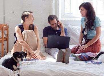 America Apparel ad titled In Bed With The Boss