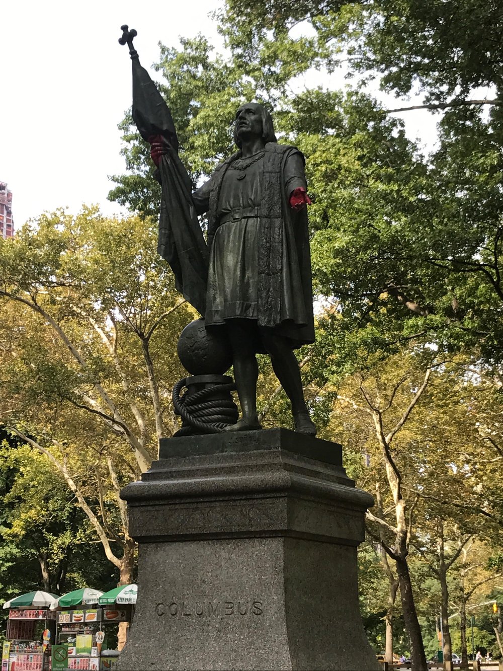 ab42638d5col1-jpg.jpeg The paint remains on the statue's hands, but the graffiti was removed from the base (Danielle Barnes / DNAinfo)