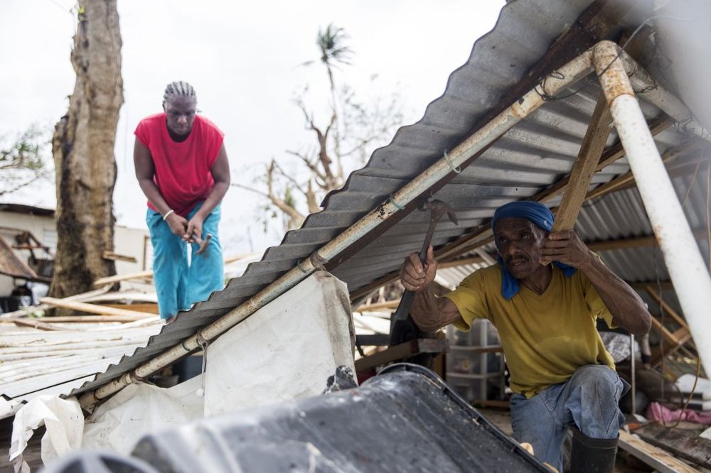 ac23e41b8092517gettypuertorico2-jpg.jpeg Residents dismantle a roof days after Hurricane Maria made landfall, Friday, September 22 in Loiza, Puerto Rico. (Alex Wroblewski/Getty Images)