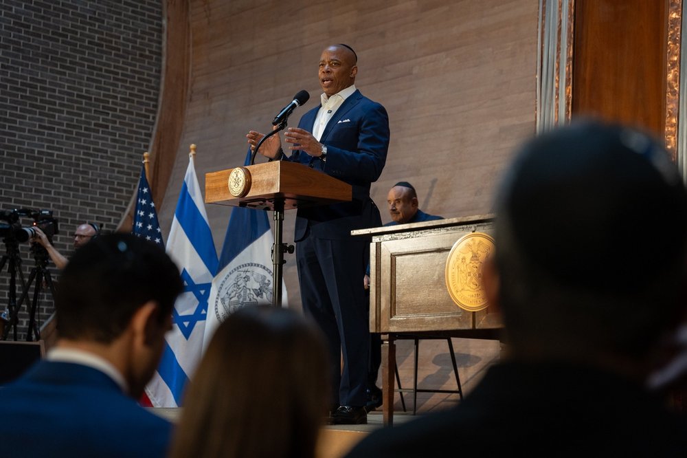 New York City Mayor Eric Adams signs an executive order meant to address antisemitism on June 8, 2025.