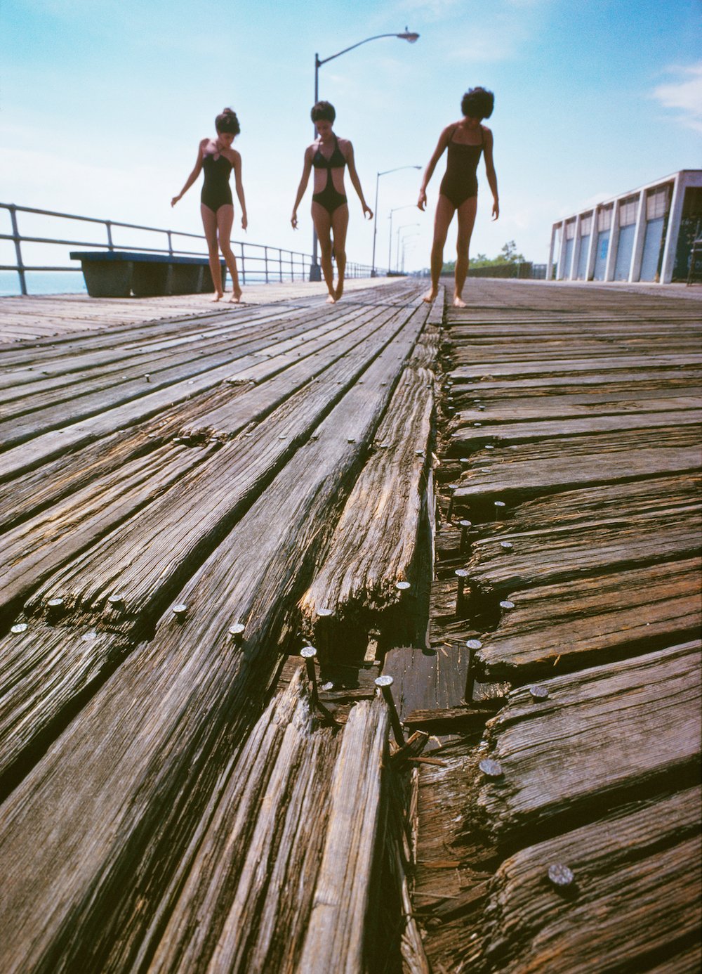 b01db03b535-girls-on-splintered-boardwalk-small-jpg.jpeg Neal Boenzi, Girls on Splintered Boardwalk, South Beach, Staten Island, 1978, NYC Parks Photo Archive
