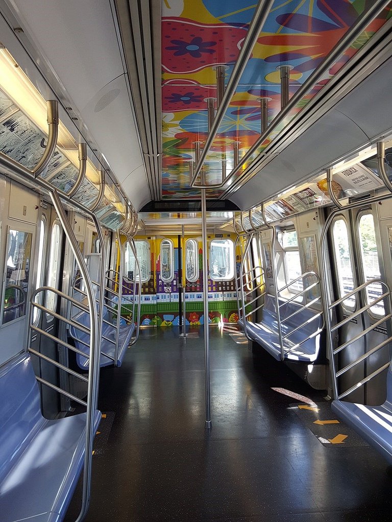 b1e14768737217732540_3f8bf6a927_b-jpg.jpeg Seats were taken out at the end of the subway cars for more standing room. <br>