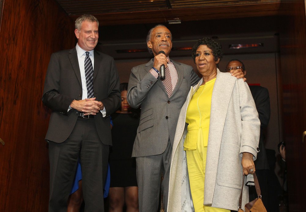 bcb3dc976shutterstock_9112489b-jpg.jpeg Mayor Bill de Blasio, the Rev. Al Sharpton, and Franklin at Sharpton's birthday in 2014 (Donald Traill/Invision/AP/Shutterstock)