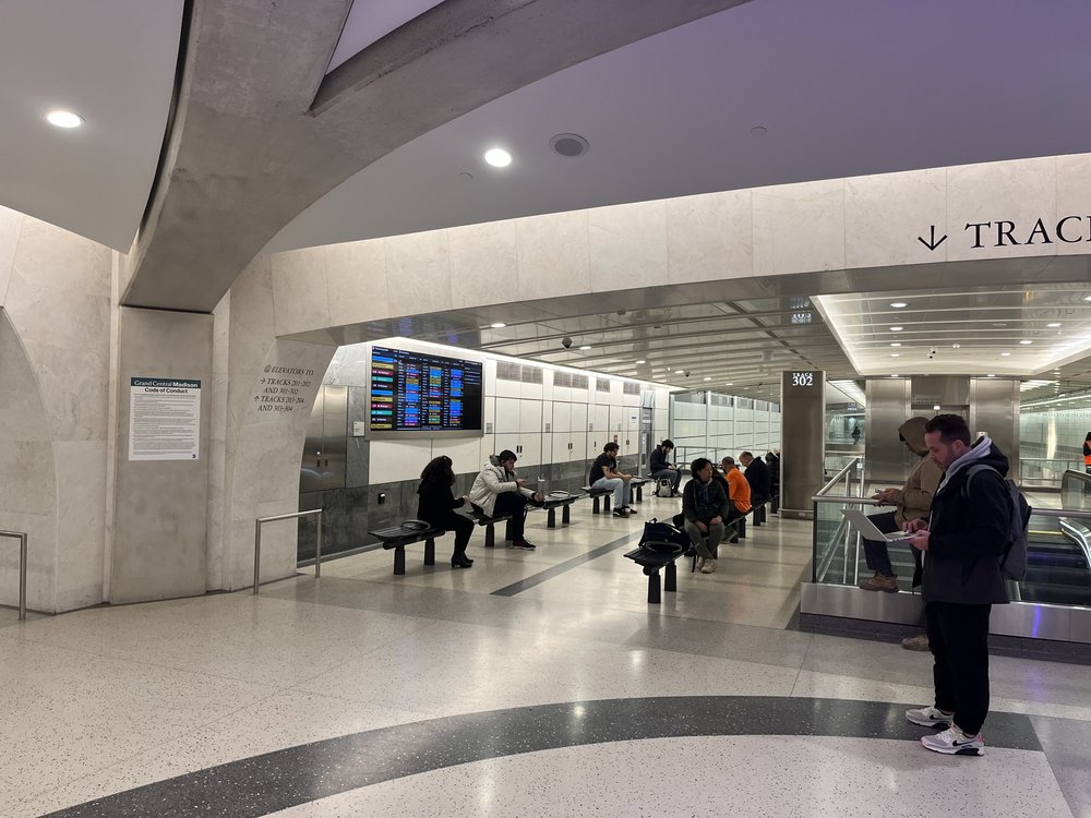 14 benches in a waiting area at Grand Central Madison