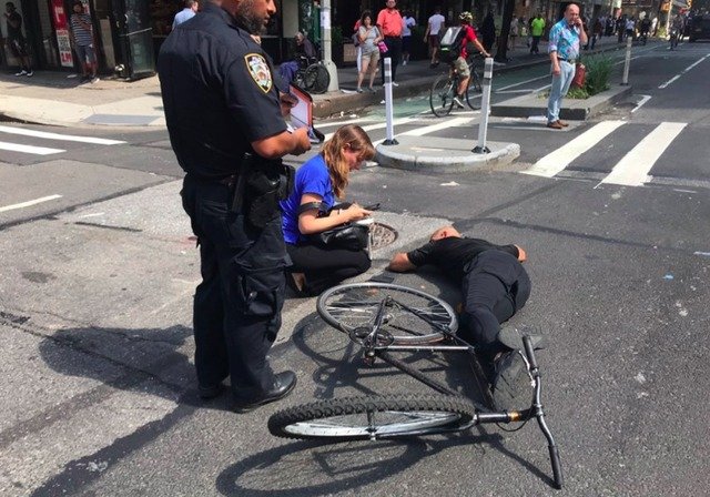 A cyclist was knocked off his bike by a hit-and-run driver on Tuesday