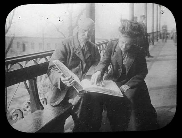 blackis051105.jpg "Library for the Blind, teaching adult blind, city house, Blackwell's Island, woman and man on porch."