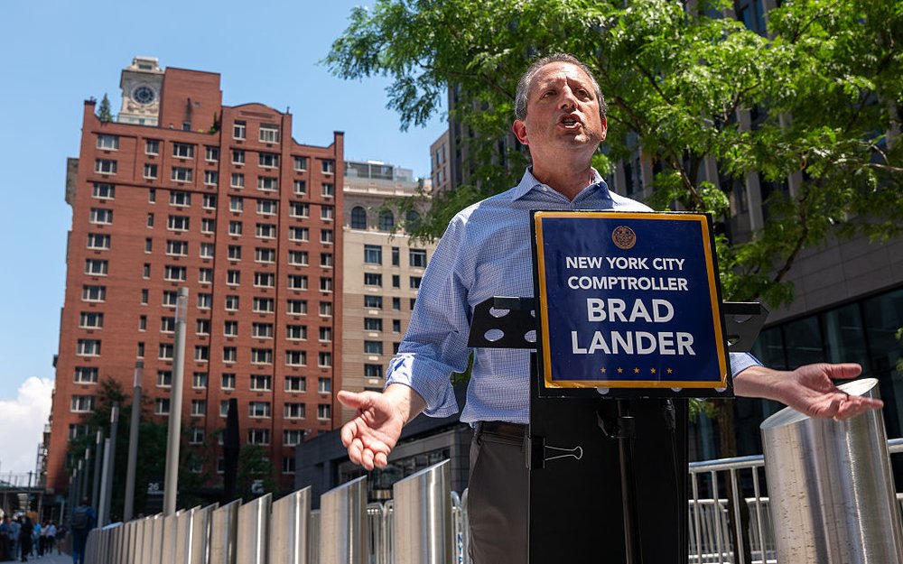 Brad Lander speaking at a podium