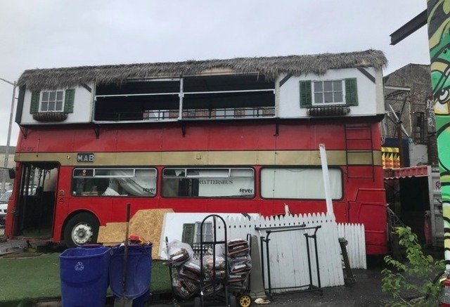 The Leyland Atlantean bus was one of the first rear-engined, front entrance double-decker buses used in the U.K. Now this one lives in a Bushwick backyard