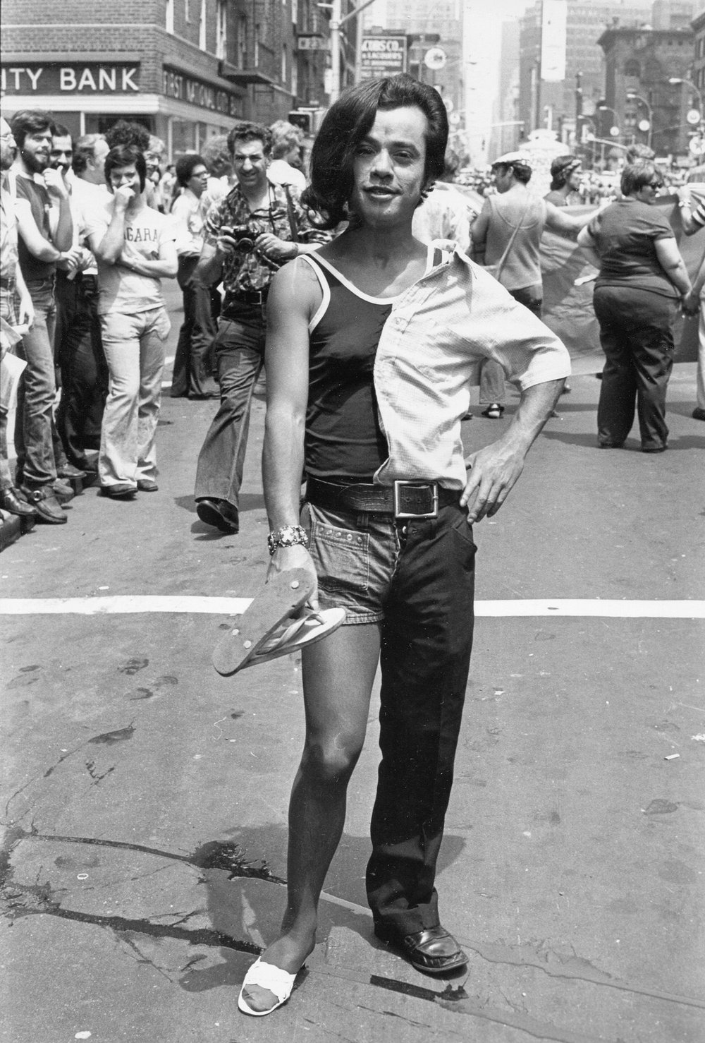 c0c88ab73fredwmcdarrah_p212-jpg.jpeg Portrait of a parade-goer at the intersection of West Twenty-Third Street and Sixth Avenue during the Sixth Annual Gay Pride March (Gay Liberation Day), June 29, 1975<br/>