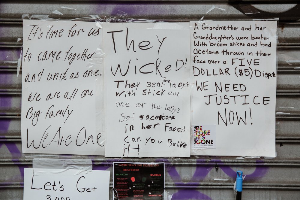 c1e20ed1820180807gothamist_nailsalonprotest-2-jpg.jpeg Signs outside the nail salon where the assault took place. <br>