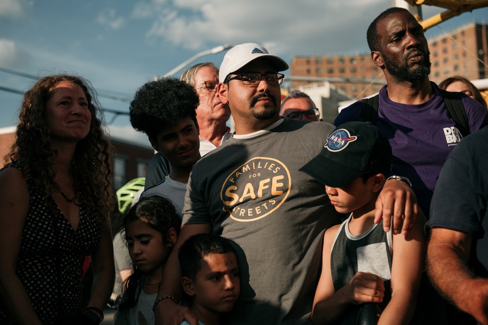 c6de5091720190702ernestaskewvigil-7-jpg.jpeg John Santiago addresses reporters.</br>