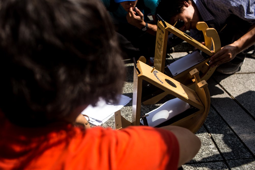 c6f8fb6d3082117solareclipseamnh-4-jpg.jpeg At the American Museum of Natural History (Scott Heins/Gothamist)