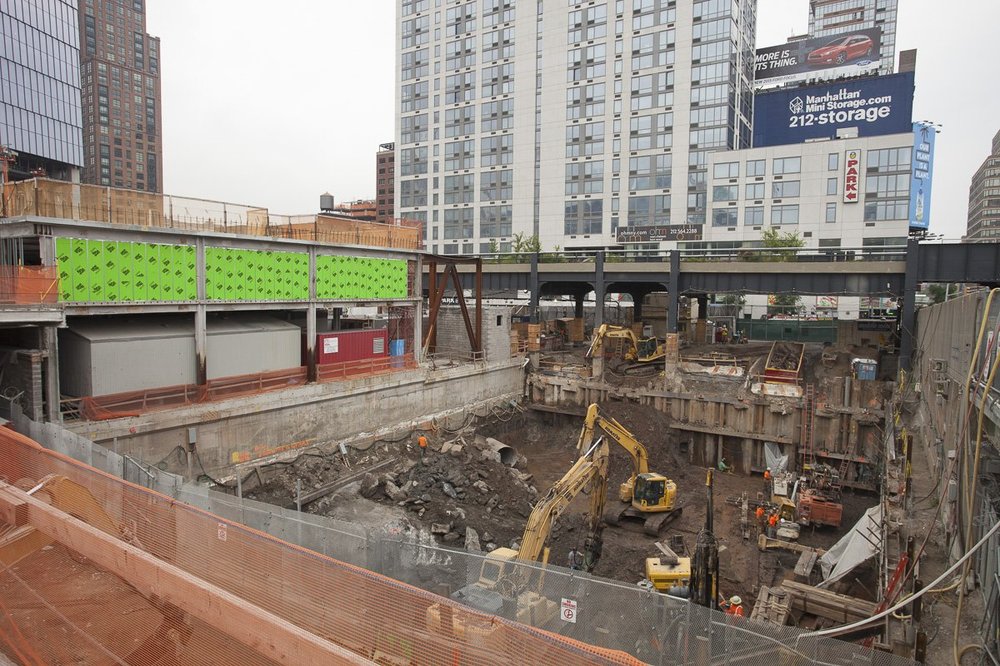 This pit will one day have 15 Hudson Yards, a curvy residential building.  To the left is the beginning of the Culture Shed.<br/>