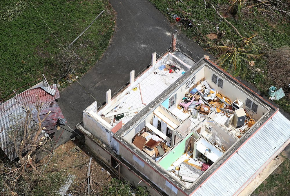 ca6cc63d2gettyimages-853698738-jpg.jpeg A destroyed home is seen as people deal with the aftermath of Hurricane Maria on September 25, 2017 in Bayamon, Puerto Rico. (Photo by Joe Raedle/Getty Images)