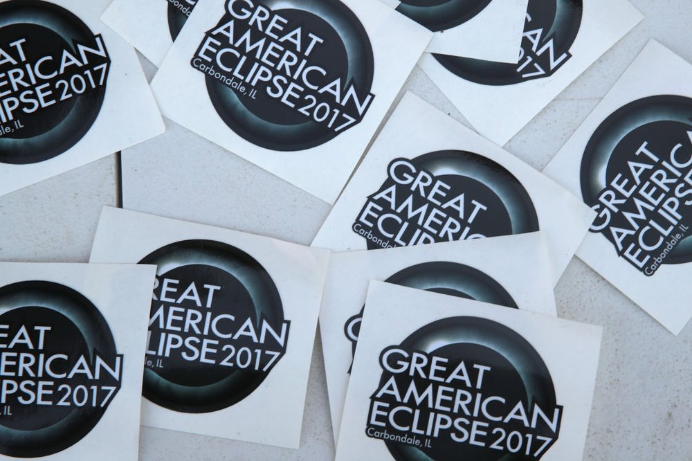 cde5ab083gettyimages-835661424-jpg.jpeg A vendor sells solar eclipse stickers on August 19, 2017 in Carbondale, Illinois.<br>