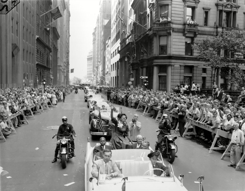 cfe56d8b8shutterstock_6615688a-jpg.jpeg Althea Gibson waves to crowds during her parade in July 1957 (AP/Shutterstock)