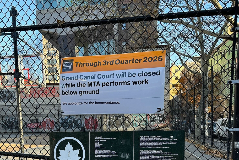 A MTA sign on a basketball court indicating the courts will be closed until the third quarter of 2026.