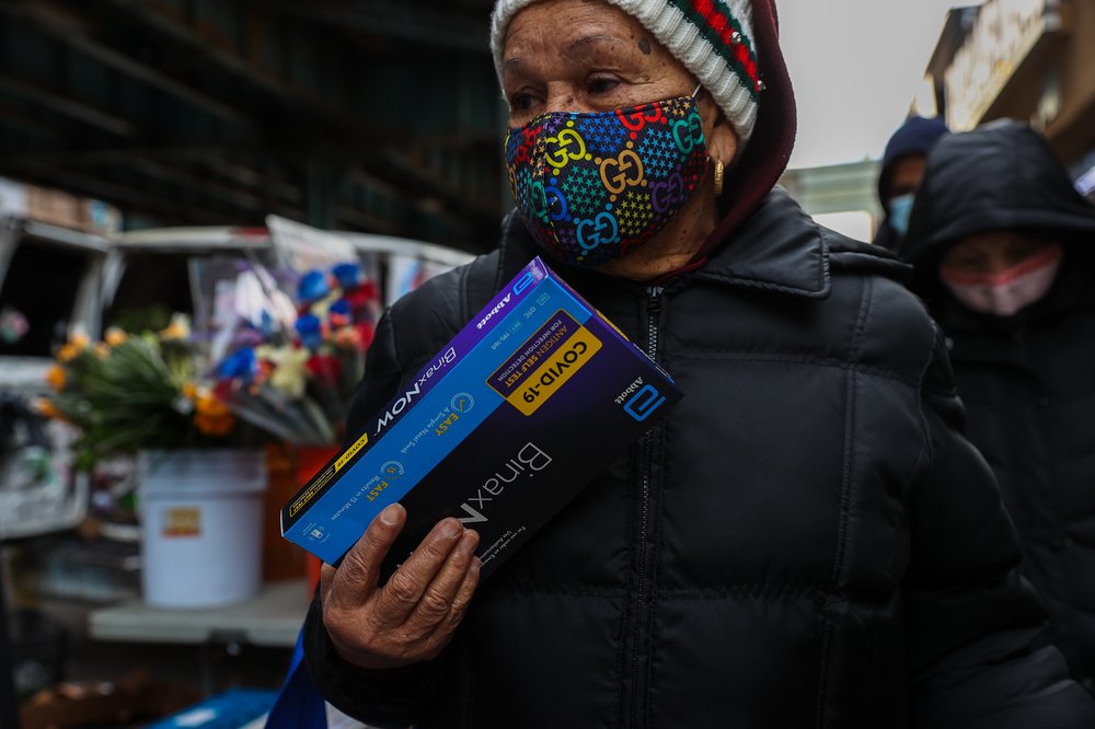 New Yorkers lineup to receive a free COVID-19 test kit in Bronx, Dec. 23, 2021.