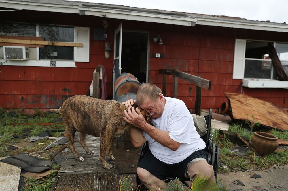 dc3e80eefgettyimages-839644576-jpg.jpeg Steve Culver cries with his dog Otis as he talks about what he said was the, 'most terrifying event in his life,' when Hurricane Harvey blew in and destroyed most of his home while he and his wife took shelter there on August 26, 2017 in Rockport, Texas<br>