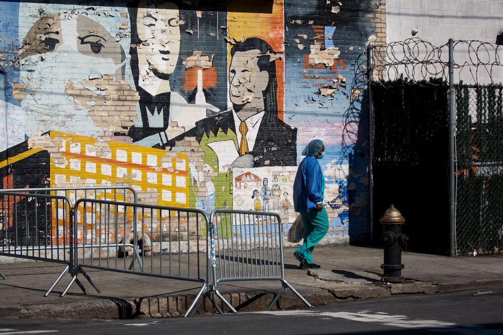 A health care worker is seen near SUNY Downstate Medical Center in Brooklyn, April 28, 2020.
