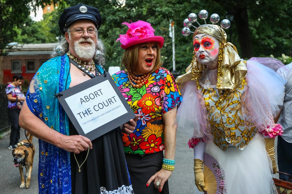 Extravagantly adorned participants in a parade