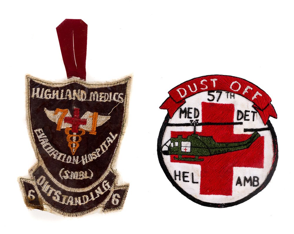 e0156341811-71st-evacuation-hospital-patch-and-57th-medical-detachment-patch-jpg.jpeg 71st Evacuation Hospital patch belonging to Barbara Chiminello (left) and 57th Medical Detachment patch belonging to Thomas Chiminello (right). Courtesy of Barbara, Philip, and Eugene Chiminello<br/>