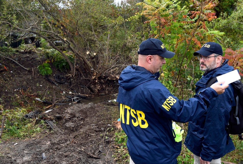 e17a203e2shutterstock_9916971a-jpg.jpeg Members of the National Transportation Safety Board view the scene of yesterday's fatal crash, in Schoharie, N.Y. (Hans Pennink/AP/Shutterstock)