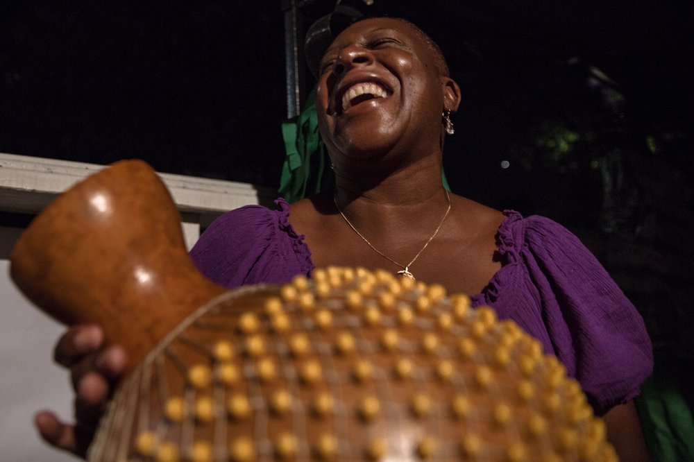 Dawn Nedd plays shaker at an evening Kutters Rhythm Section practice last Thursday in East Flatbush.