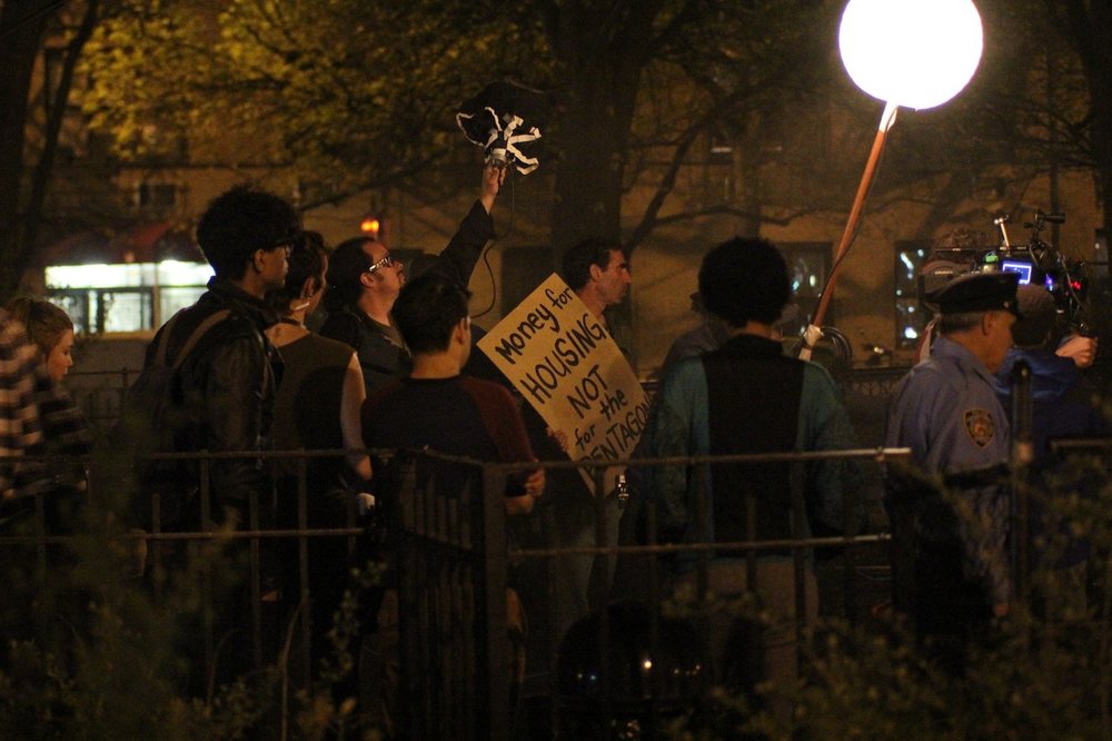 ec292c885.jpeg 'Money for Housing Not for the Pentagon' did not ring any bells as a slogan of the Tompkins Square Park riots for those who could recall them.<br/>