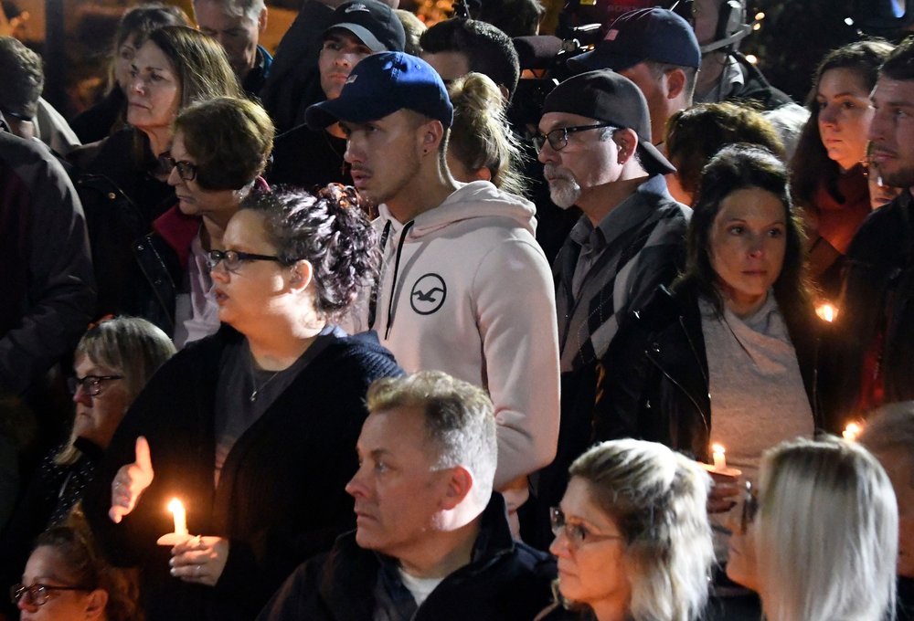 ec2fb558ashutterstock_9918686f-jpg.jpeg Family members and friends gather for a candlelight vigil memorial at Mohawk Valley Gateway Overlook Pedestrian Bridge in Amsterdam, N.Y., . The memorial honored 20 people who died in Saturday's fatal limousine crash in Schoharie, N.Y<br>