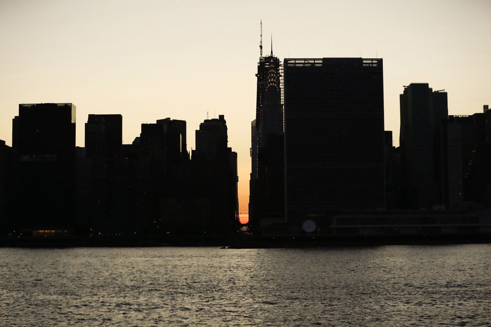 ecac6effashutterstock_10333975d-jpg.jpeg The sun set behind the darkened buildings on July 13, 2019 (Vanessa Carvalho/Shutterstock)